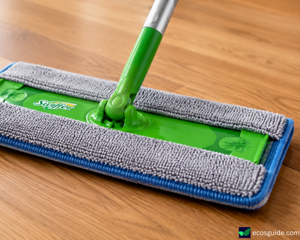 reusable swiffer pads clipped onto swiffer sweeper head
