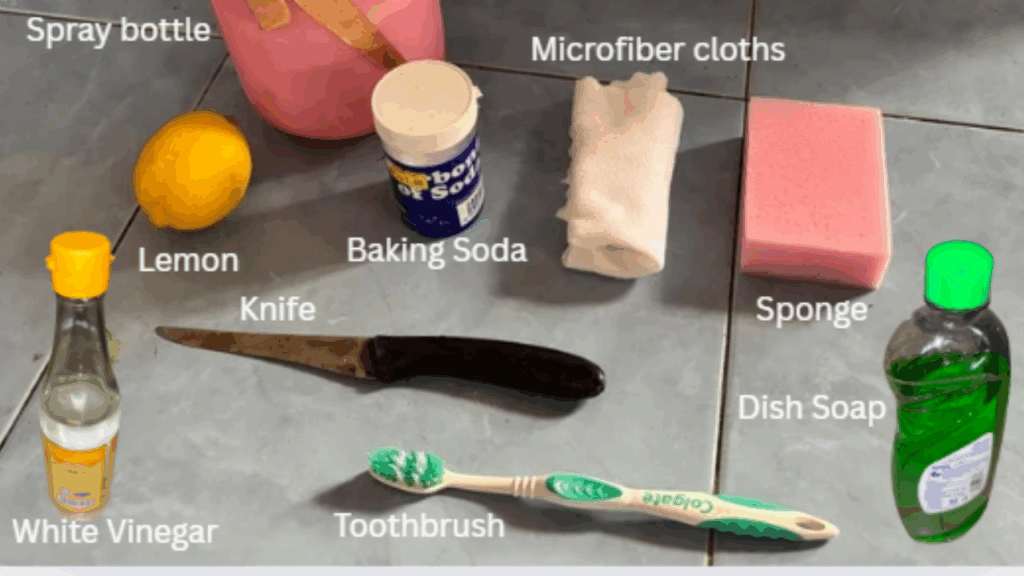 Natural gas stove top cleaning supplies: lemon, baking soda, vinegar, and a microfiber cloth