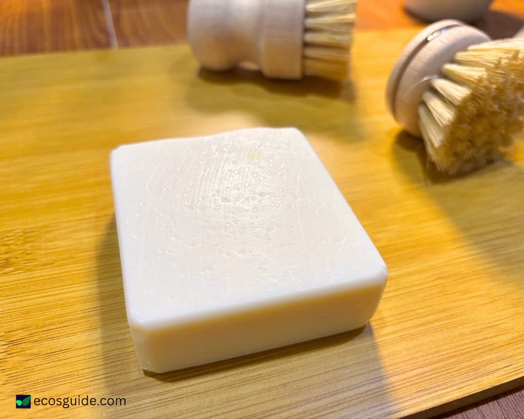 Close-up of a dish soap bar on a wooden countertop